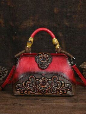 Beautiful vintage-inspired embossed floral design handbag/purse.